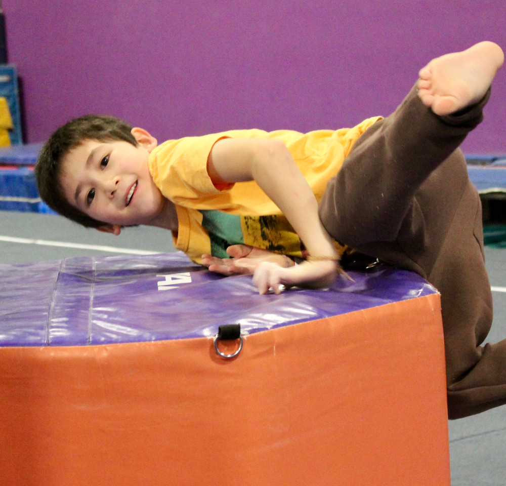 Child on a ninja obstacle
